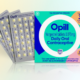 A box of Opill next to three month packs of pills