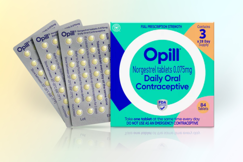 A box of Opill next to three month packs of pills