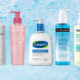 Selection of five gentle face washes in front of bubbly background